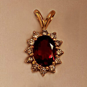 14Karat yellow gold Diamonds with Oval Rhodolite pendant