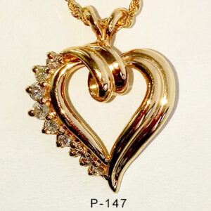14Karat yellow gold heart shaped pendant with 0.75ct diamonds