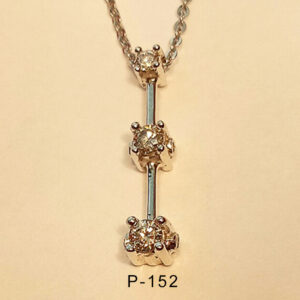 18karat white gold diamond pendant with graduated size diamonds