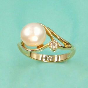 8mm culture pearl set in a diamond ring